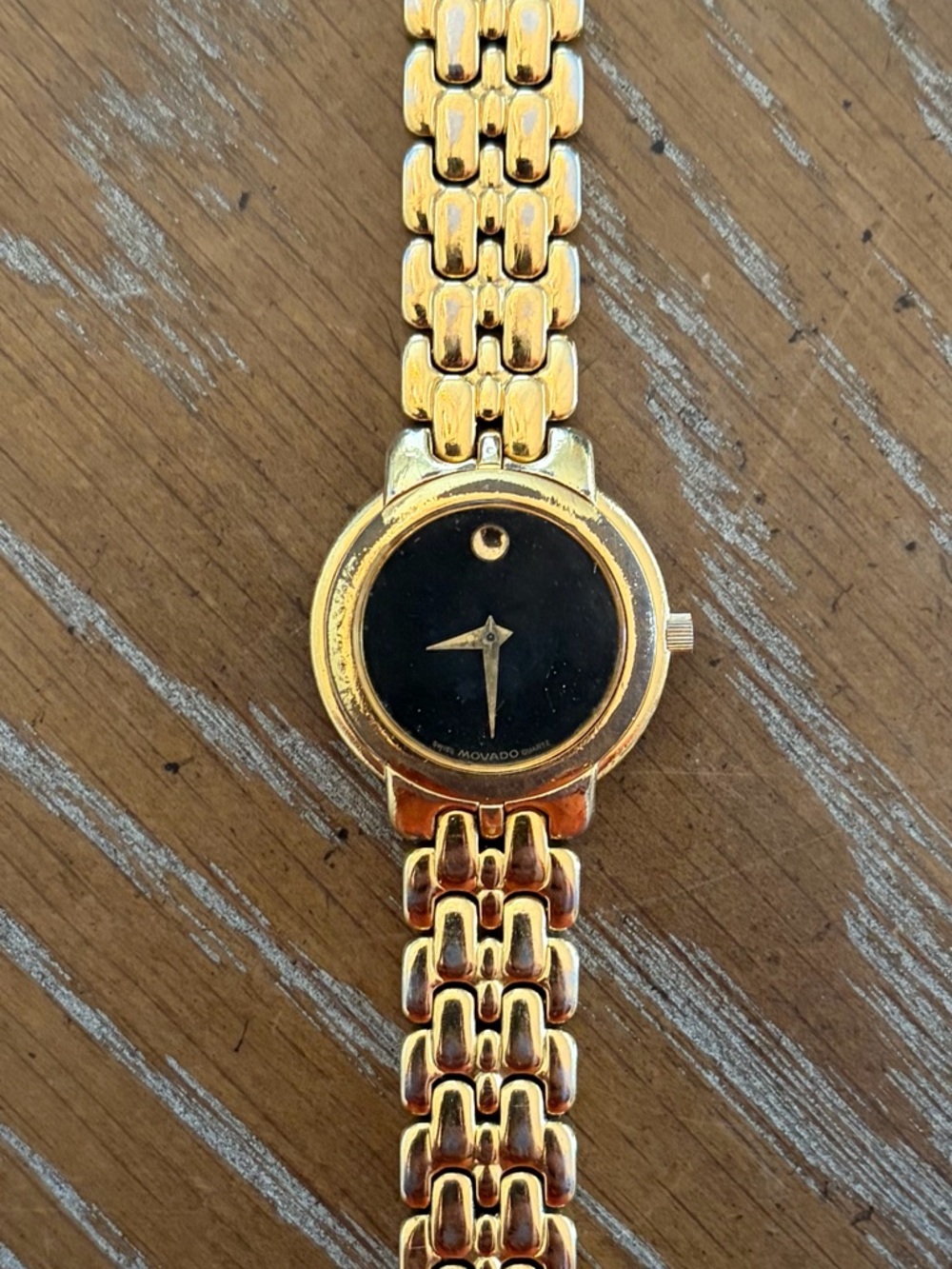 Movado Gold and Black Minimalist Bracelet Watch